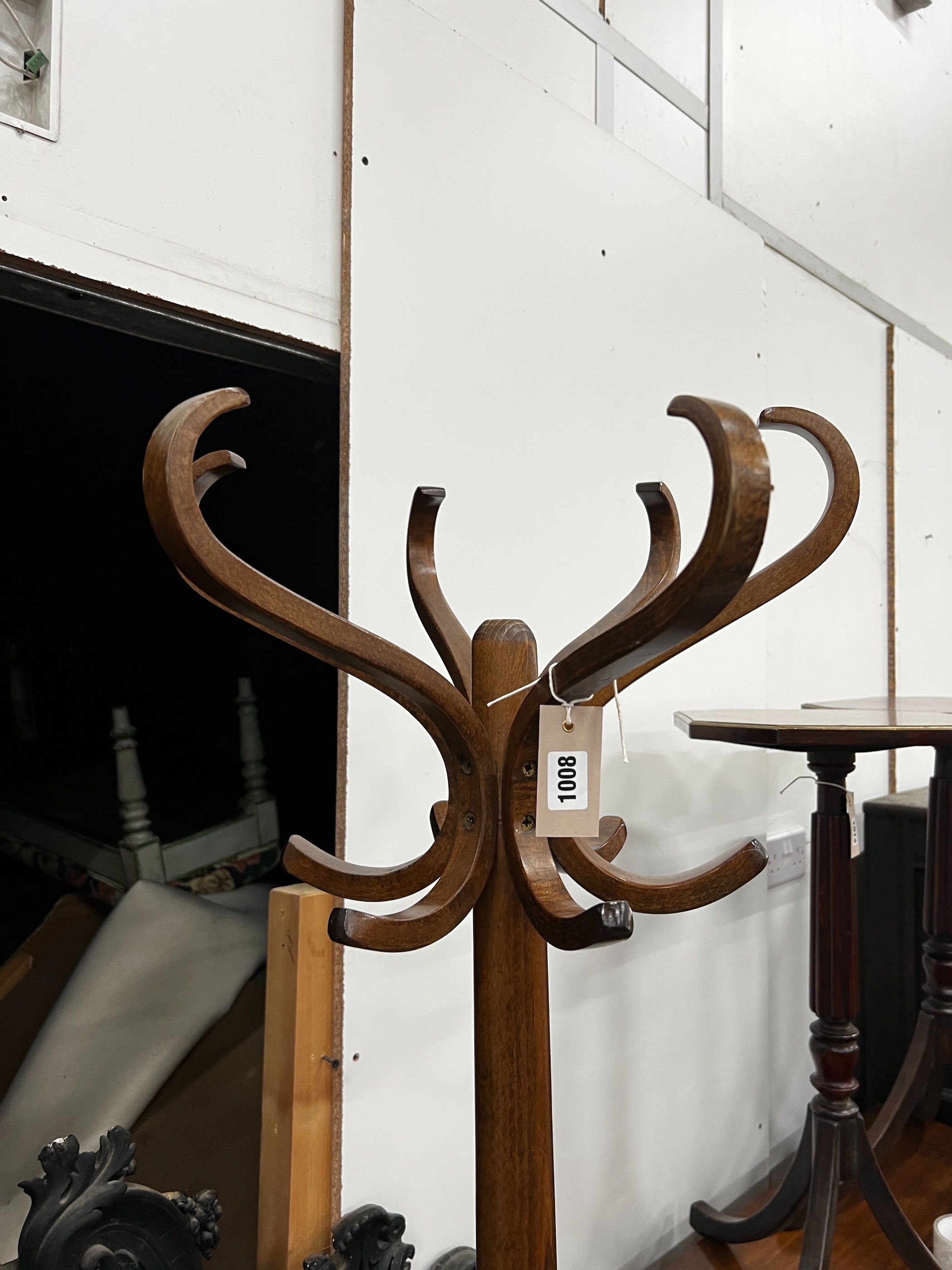 A beech Bentwood coat stand labelled Baumann, height 182cm